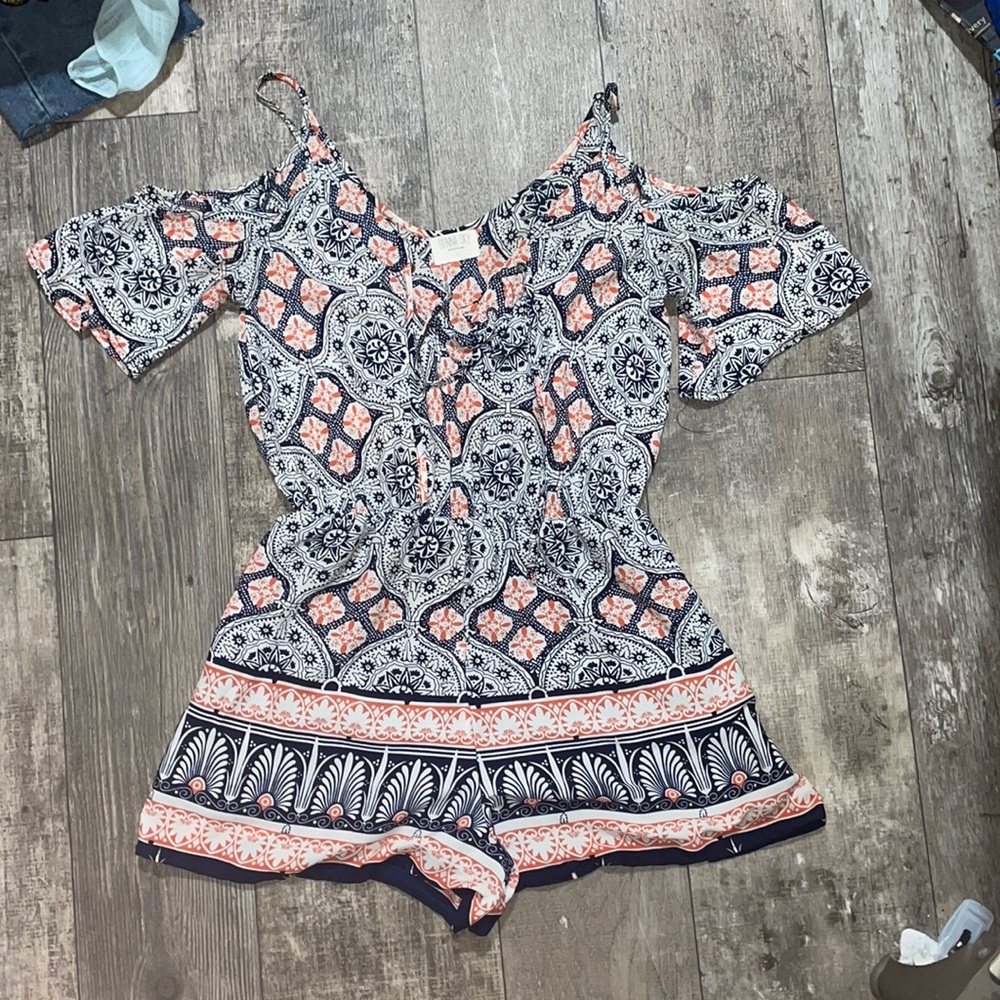 Sienna Sky Navy blue, orange, and white romper